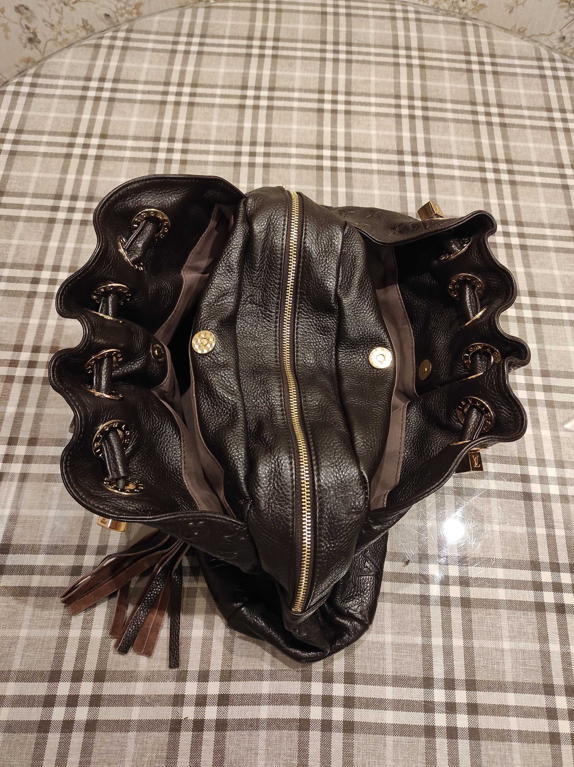 Сумочка то  Louis Vuitton