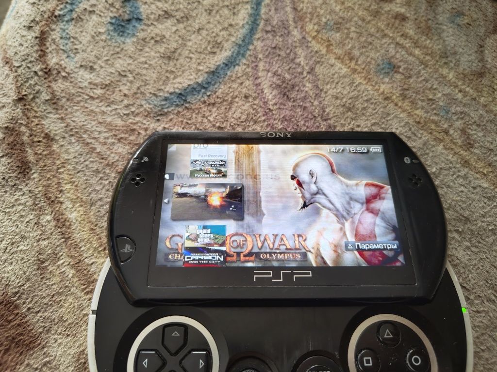 Продам psp go 16gb
