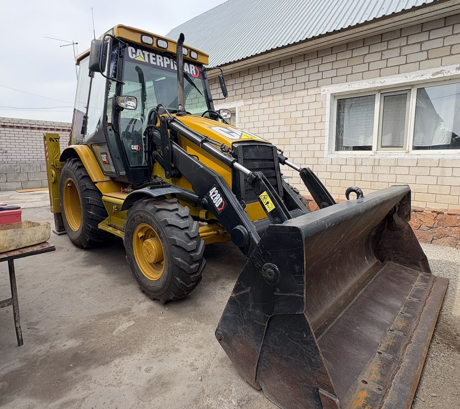 Трактор CAT 428D