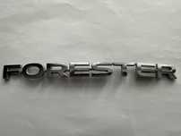 логотип на Subaru Forester