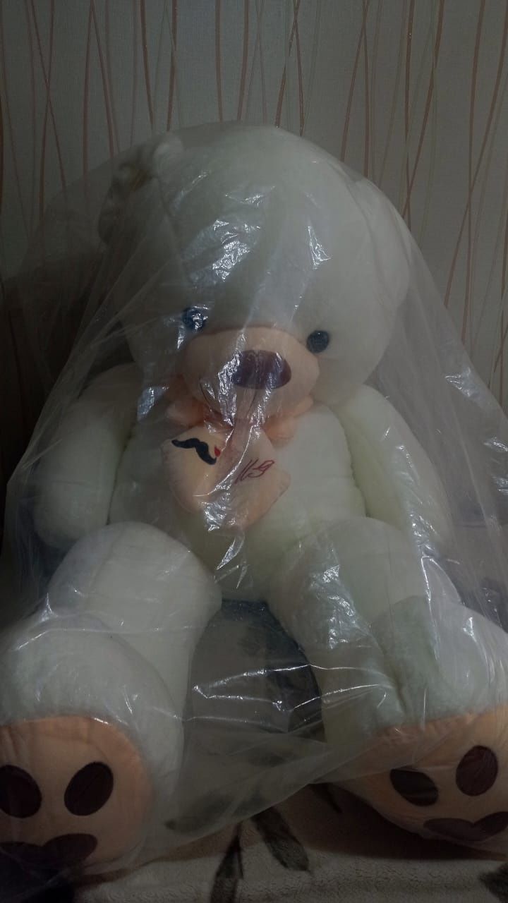 Продам игрушку медведя