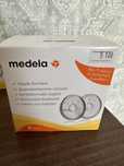 Medela прокладки для груди новые и другое