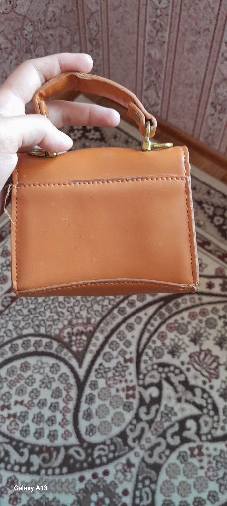 Продаётся мини коричневая сумка