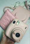 Instax mini 11 розового цвета