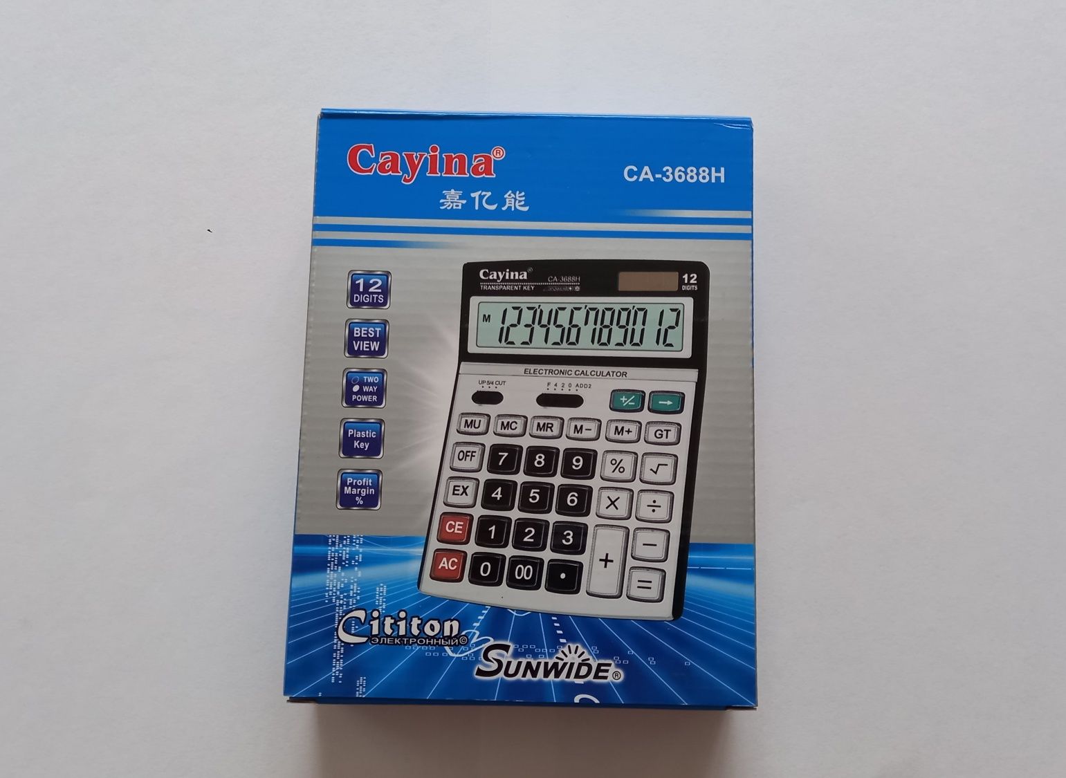 Продам калькулятор Cayina новый
