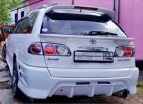 Бампер задний Toyota Caldina