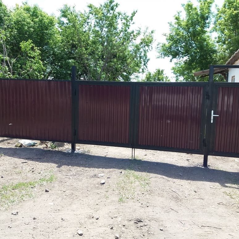 Монтаж секционных,откатных ворот.