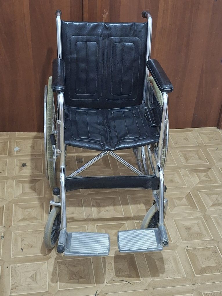 Инвалидная коляска