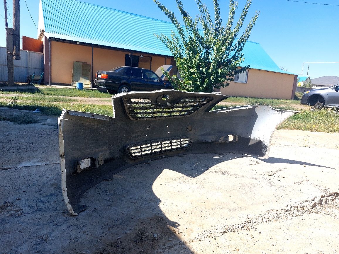Бампер Toyota Camry 40 оригинал