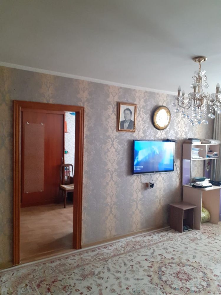 Продам 4 комнатную квартиру в центре