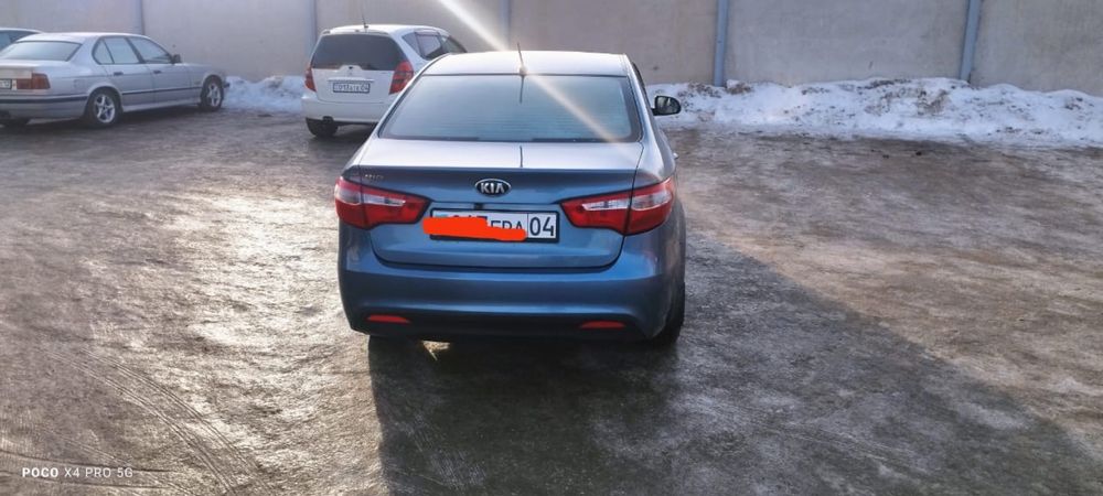 Kia rio 2013 год