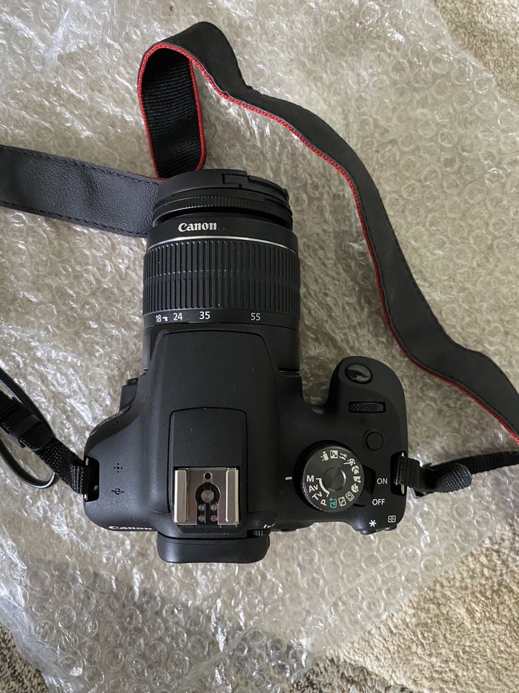 Зеркальный фотоаппарат Canon EOS 2000D и Камера Sony