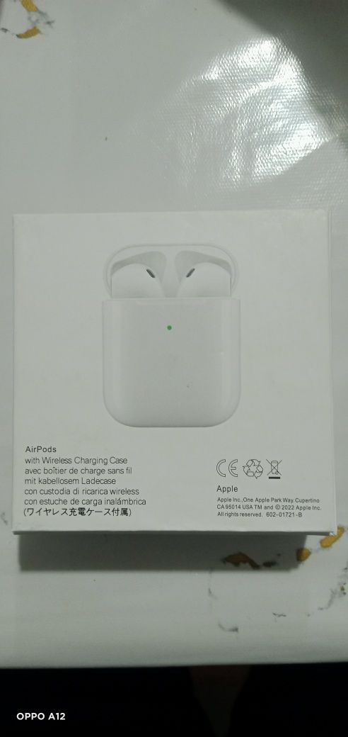 Apple AirPods, безпроводные наушники.