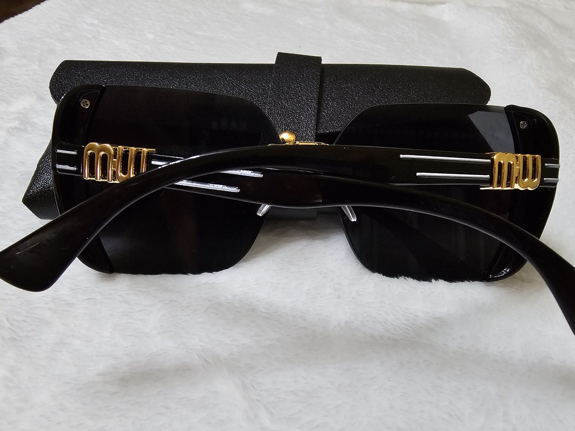 Солнцезащитные очки  Miu Miu (Миу Миу)