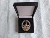 Квалификационный знак.