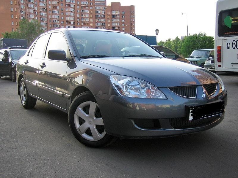 Бампер передний на Mitsubishi Lancer/Митсубиши Лансер '04-'07