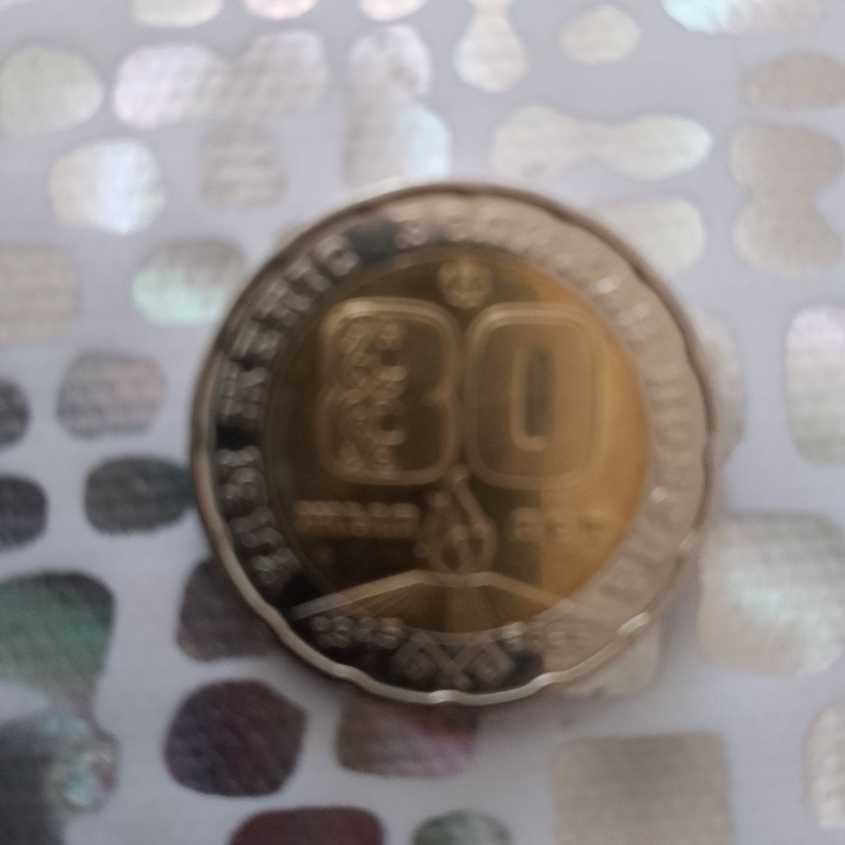 Продам монету 200тенге.30000.